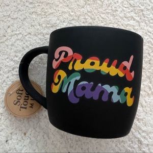 Pride mug with the words PROUD MAMA in rainbow colors